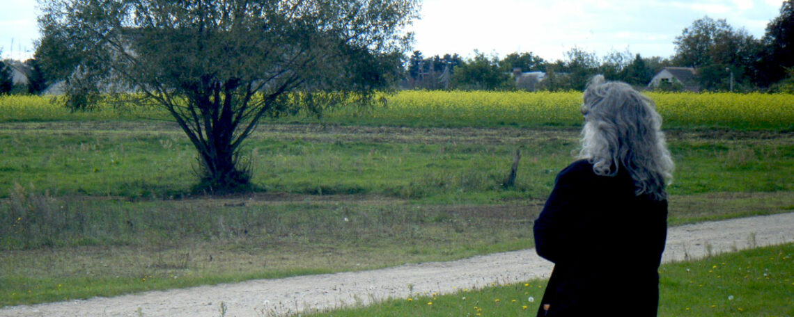 Ally Klein O'Connor Walking in a Field