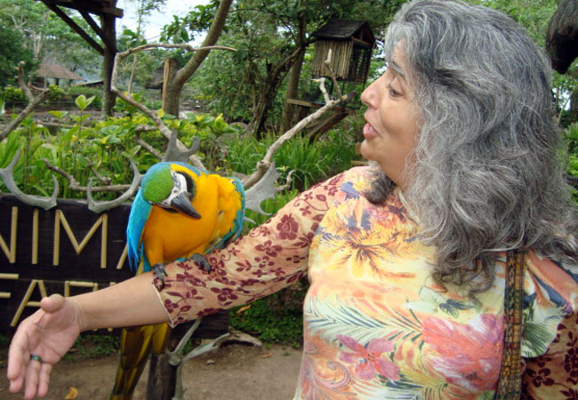 Sally with a Parrot on her arm